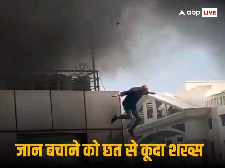 A massive fire broke out in a multi-storey building in Bengaluru, a person jumped from the roof, the video will give you goosebumps.